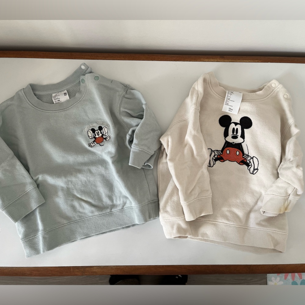 Two Mickey Mouse sweaters